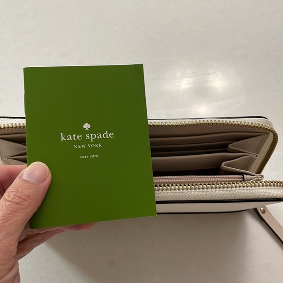 Never used Kate Spade zip up wallet. - Picture 3 of 4